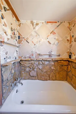 a bathroom with a bathtub