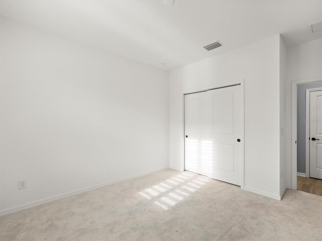 5219 Cappleman Loop Brooksville, FL 34601 - Photo 11 of 60 a view of an empty room