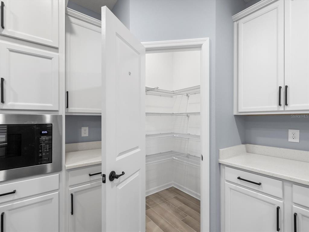 5219 Cappleman Loop Brooksville, FL 34601 - Photo 16 of 60 a bathroom with a shower