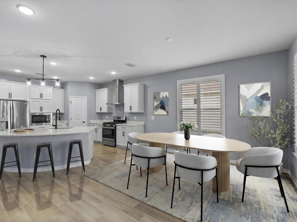 5219 Cappleman Loop Brooksville, FL 34601 - Photo 2 of 60 a view of a dining room with furniture and window