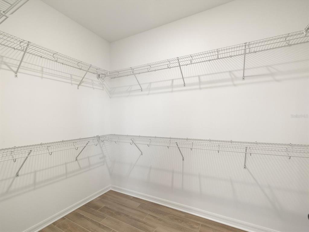 5219 Cappleman Loop Brooksville, FL 34601 - Photo 23 of 60 a view of a room with racks on the wall
