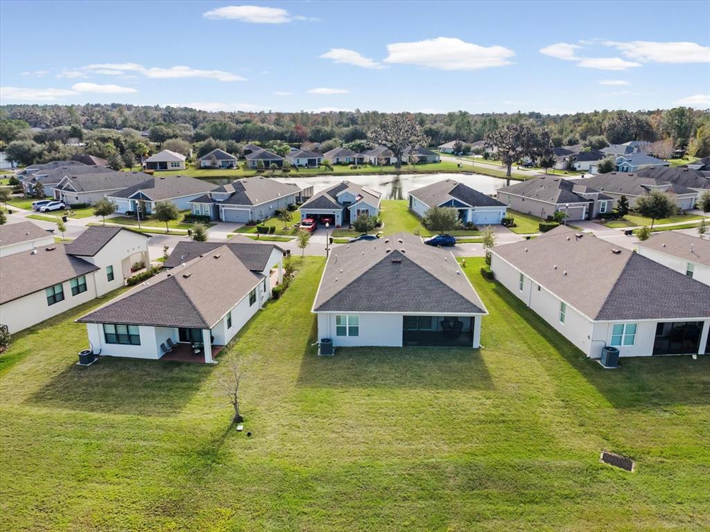 5219 Cappleman Loop Brooksville, FL 34601 - Photo 37 of 60 a view of a lake with houses