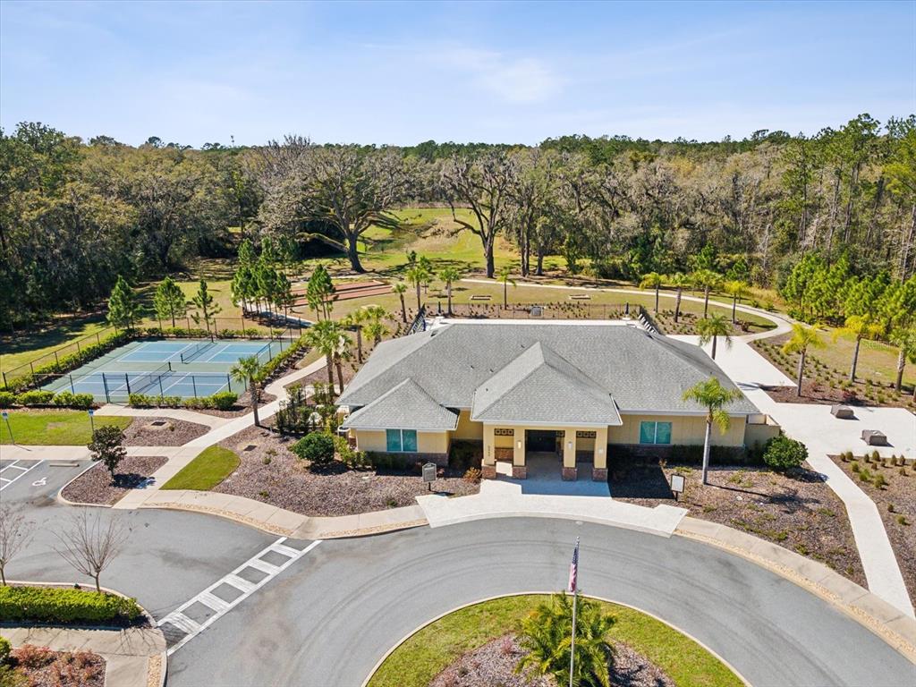 5219 Cappleman Loop Brooksville, FL 34601 - Photo 56 of 60 a view of a house with a swimming pool