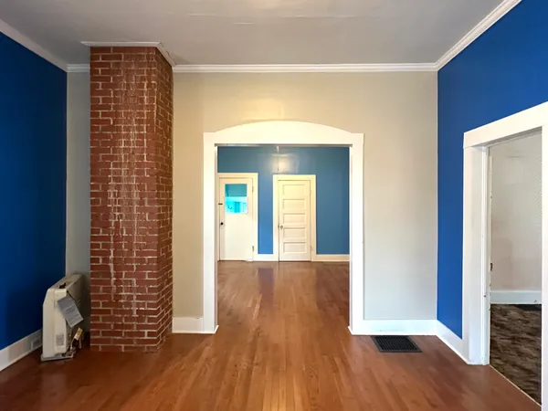 a view of livingroom with wooden floor