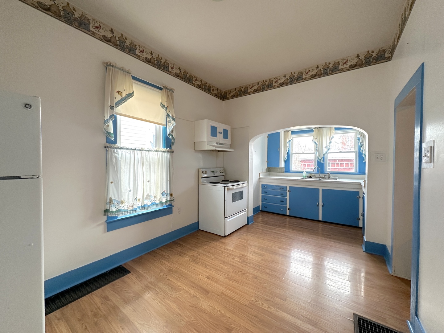 1821 Division Street Murphysboro, IL 62966 - Photo 8 of 16 a view of kitchen with utility room and windows
