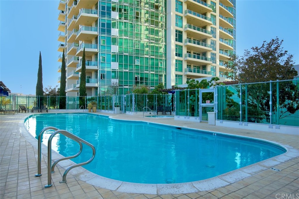 a view of a swimming pool with a balcony