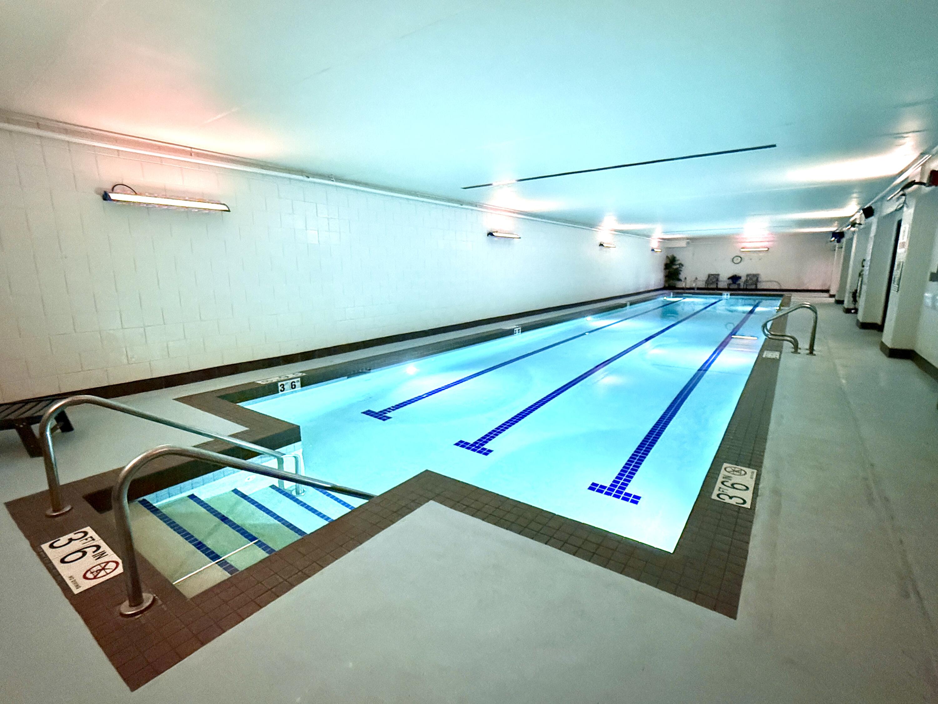 270 East Highland Avenue, Unit 446 Milwaukee, WI 53202 - Photo 23 of 29 Locker rooms lead to pool