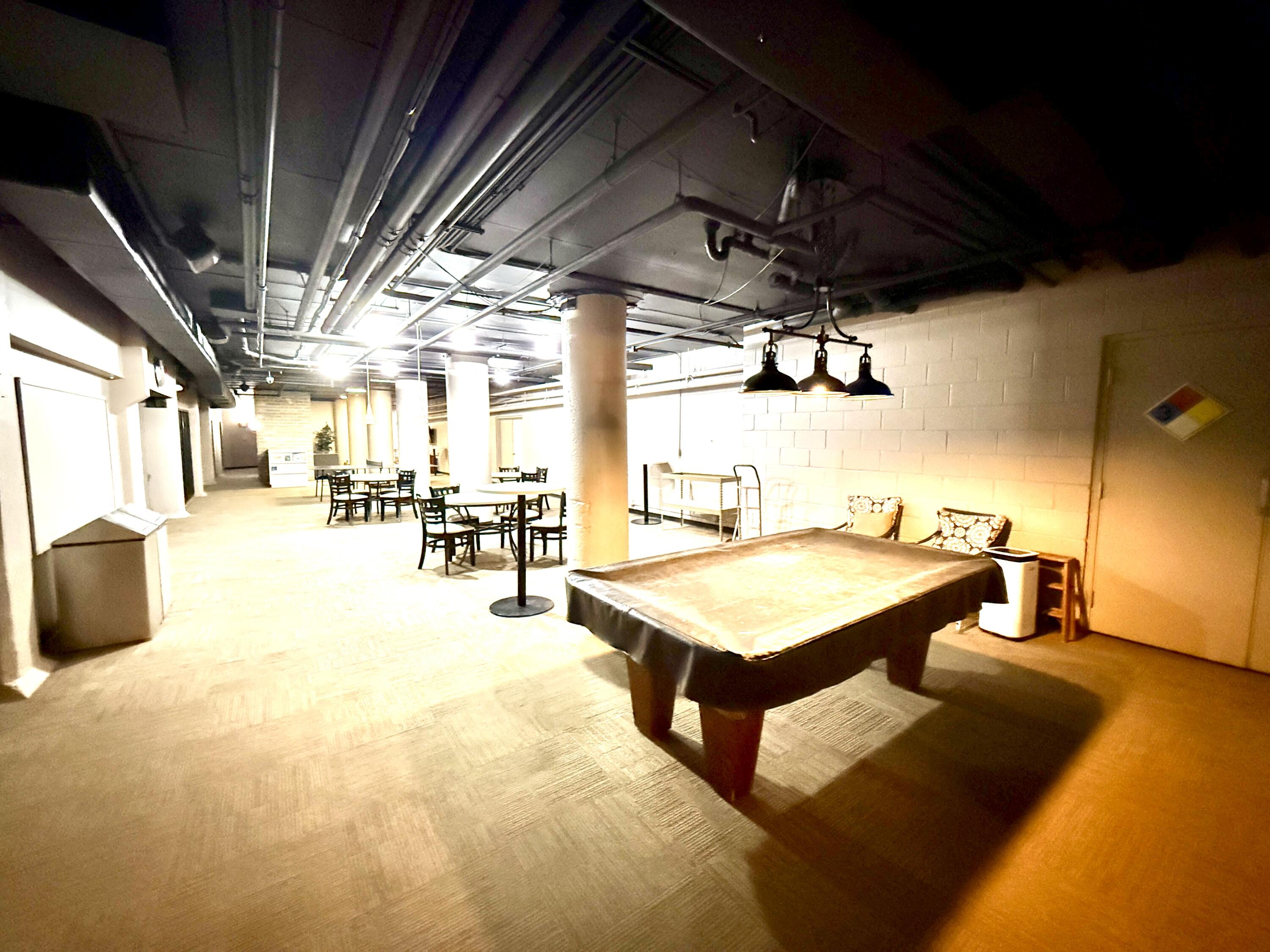 270 East Highland Avenue, Unit 446 Milwaukee, WI 53202 - Photo 25 of 29 Ping pong, pool, socializing room
