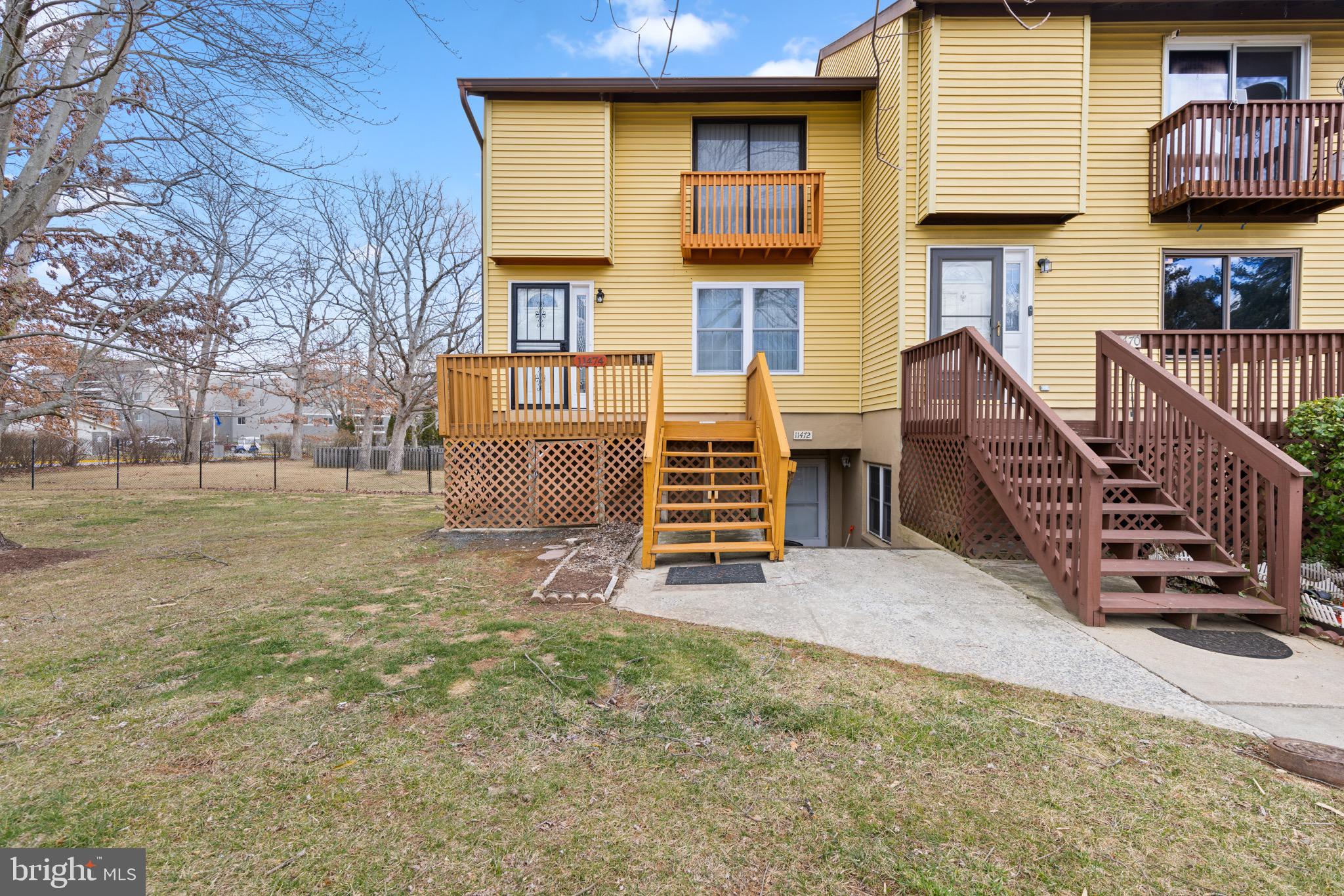 11474 Laurelwalk Drive Laurel, MD 20708 - Photo 3 of 22 a view of a house with a yard