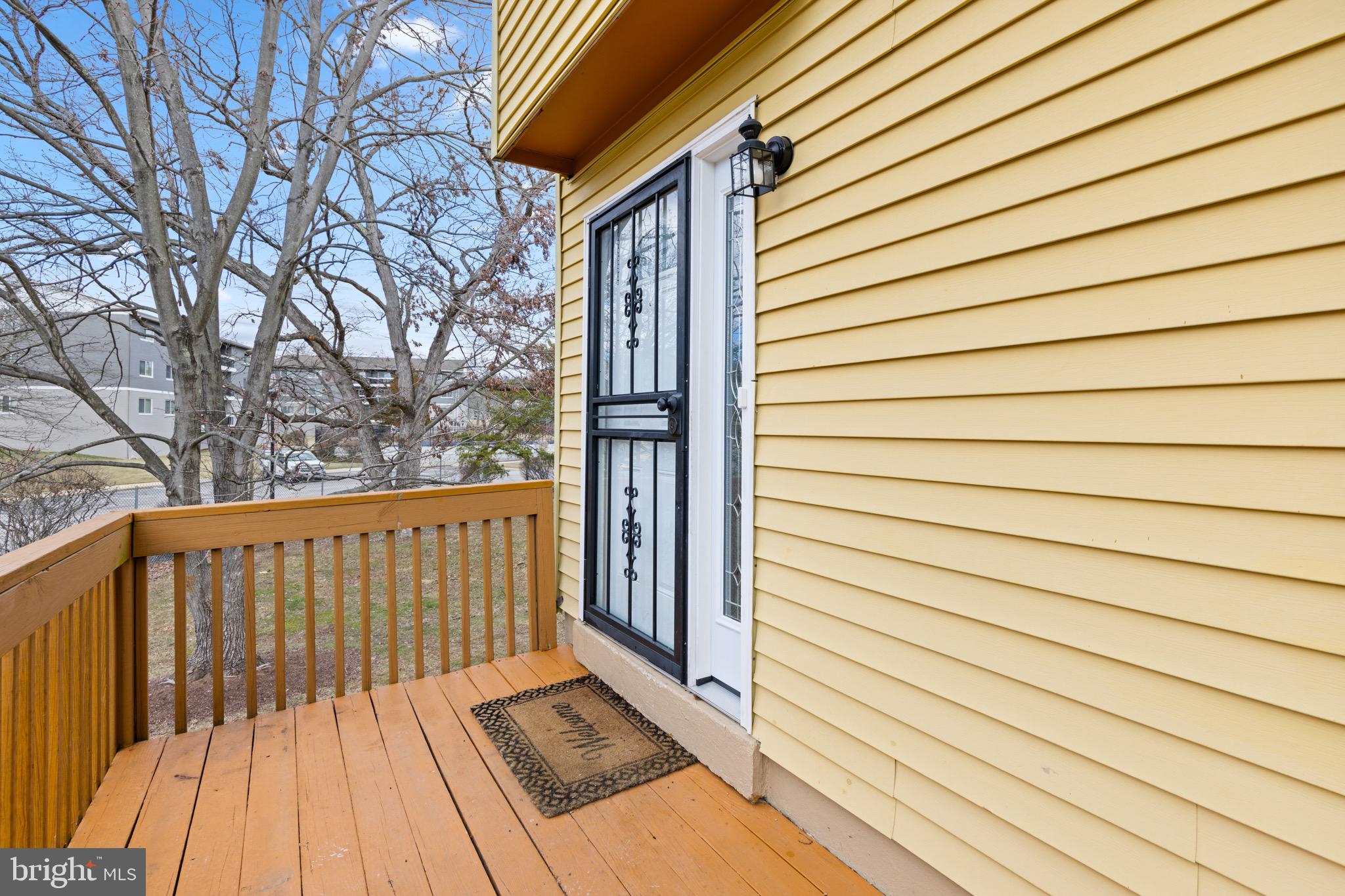 11474 Laurelwalk Drive Laurel, MD 20708 - Photo 4 of 22 a view of wooden balcony