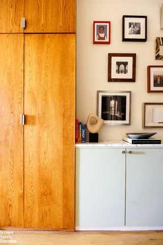 a view of a livingroom with furniture and a flat screen tv