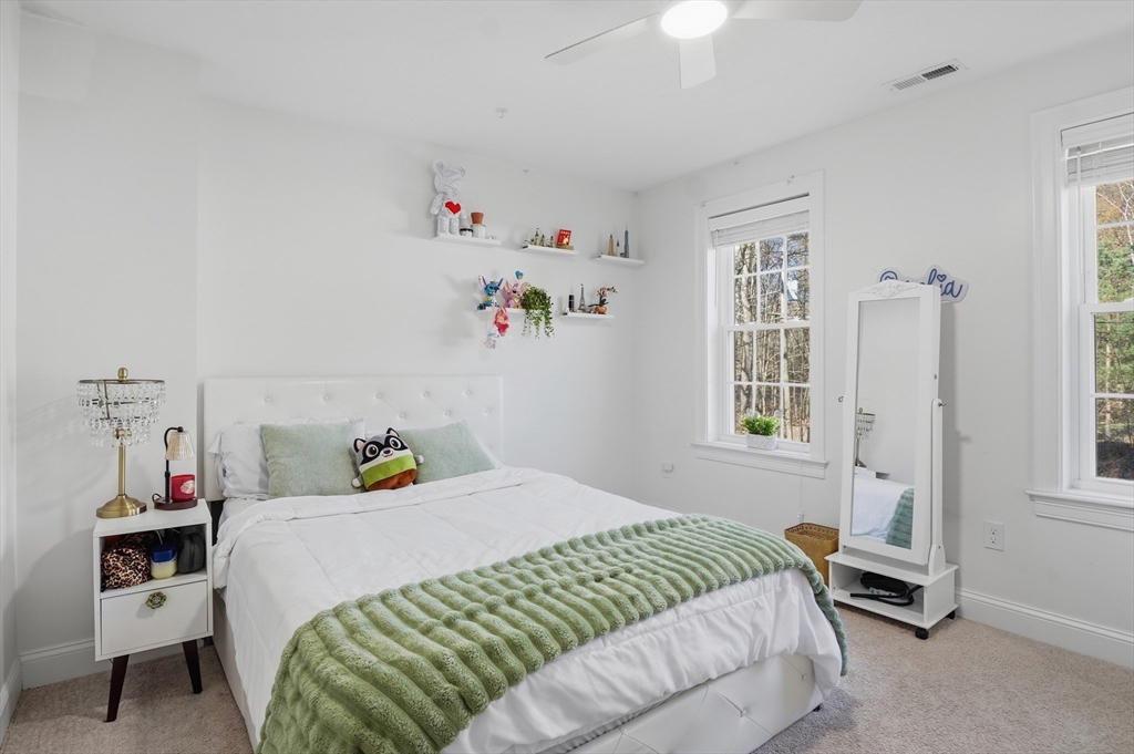155 Turkey Hill Road Rutland, MA 01543 - Photo 15 of 38 a bedroom with a bed and a window