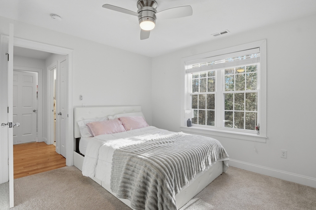 155 Turkey Hill Road Rutland, MA 01543 - Photo 17 of 38 a bedroom with a bed and a window