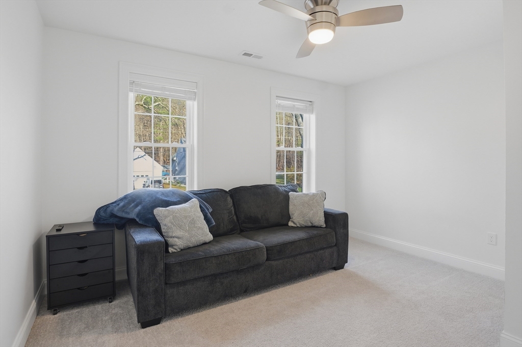 155 Turkey Hill Road Rutland, MA 01543 - Photo 19 of 38 a living room with furniture and a window