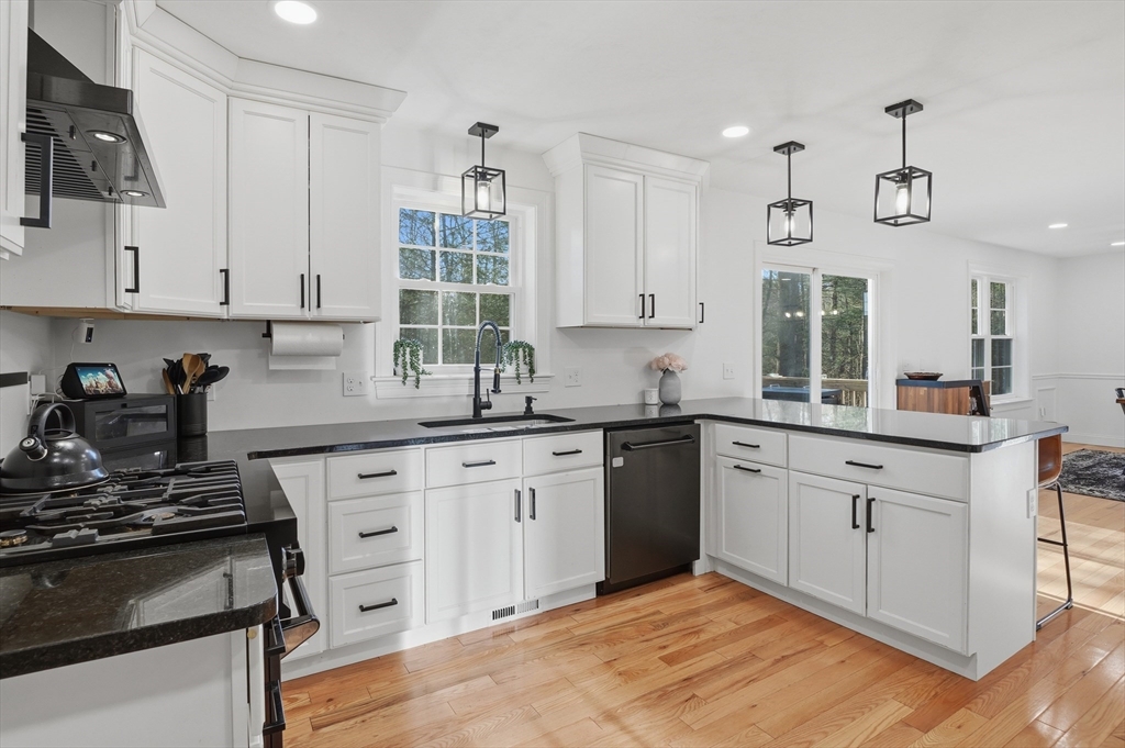155 Turkey Hill Road Rutland, MA 01543 - Photo 2 of 38 a kitchen with cabinets appliances and a window