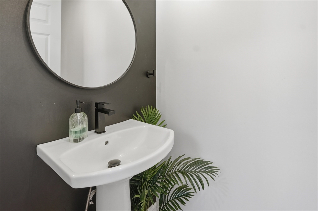 155 Turkey Hill Road Rutland, MA 01543 - Photo 25 of 38 a bathroom with a sink and a mirror