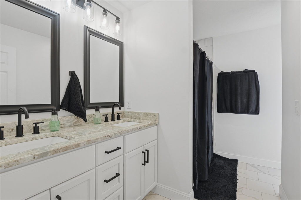 155 Turkey Hill Road Rutland, MA 01543 - Photo 27 of 38 a bathroom with a granite countertop sink and a mirror