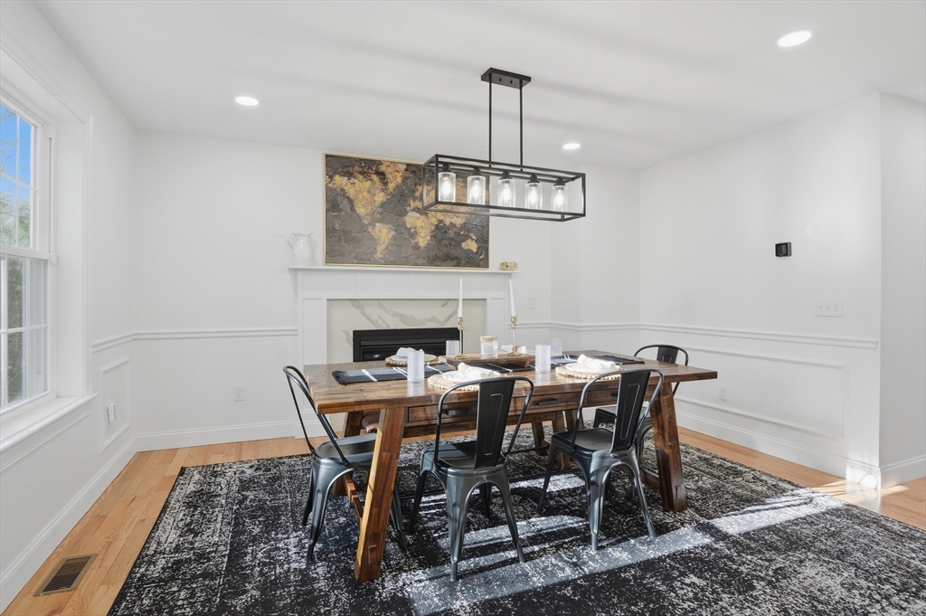 155 Turkey Hill Road Rutland, MA 01543 - Photo 7 of 38 a view of a dining room with furniture wooden floor and a chandelier
