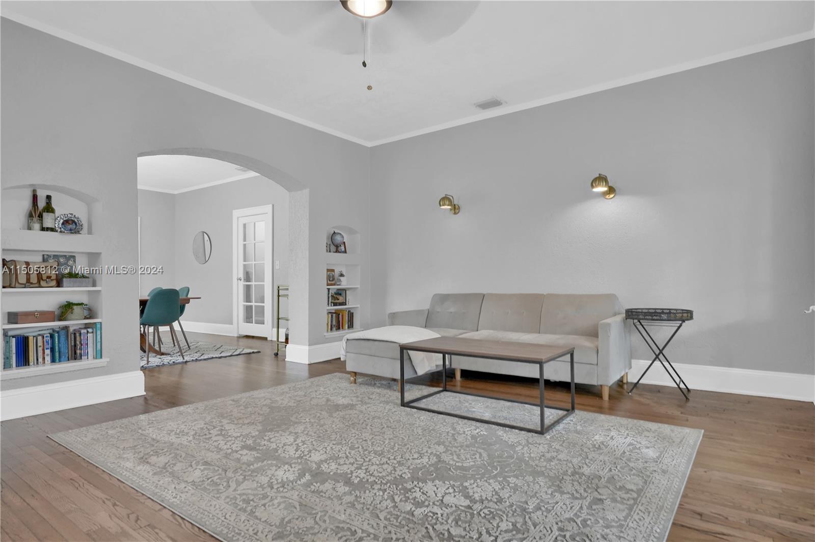 2043 Southwest 7th Street Miami, FL 33135 - Photo 12 of 37 a living room with furniture and a rug