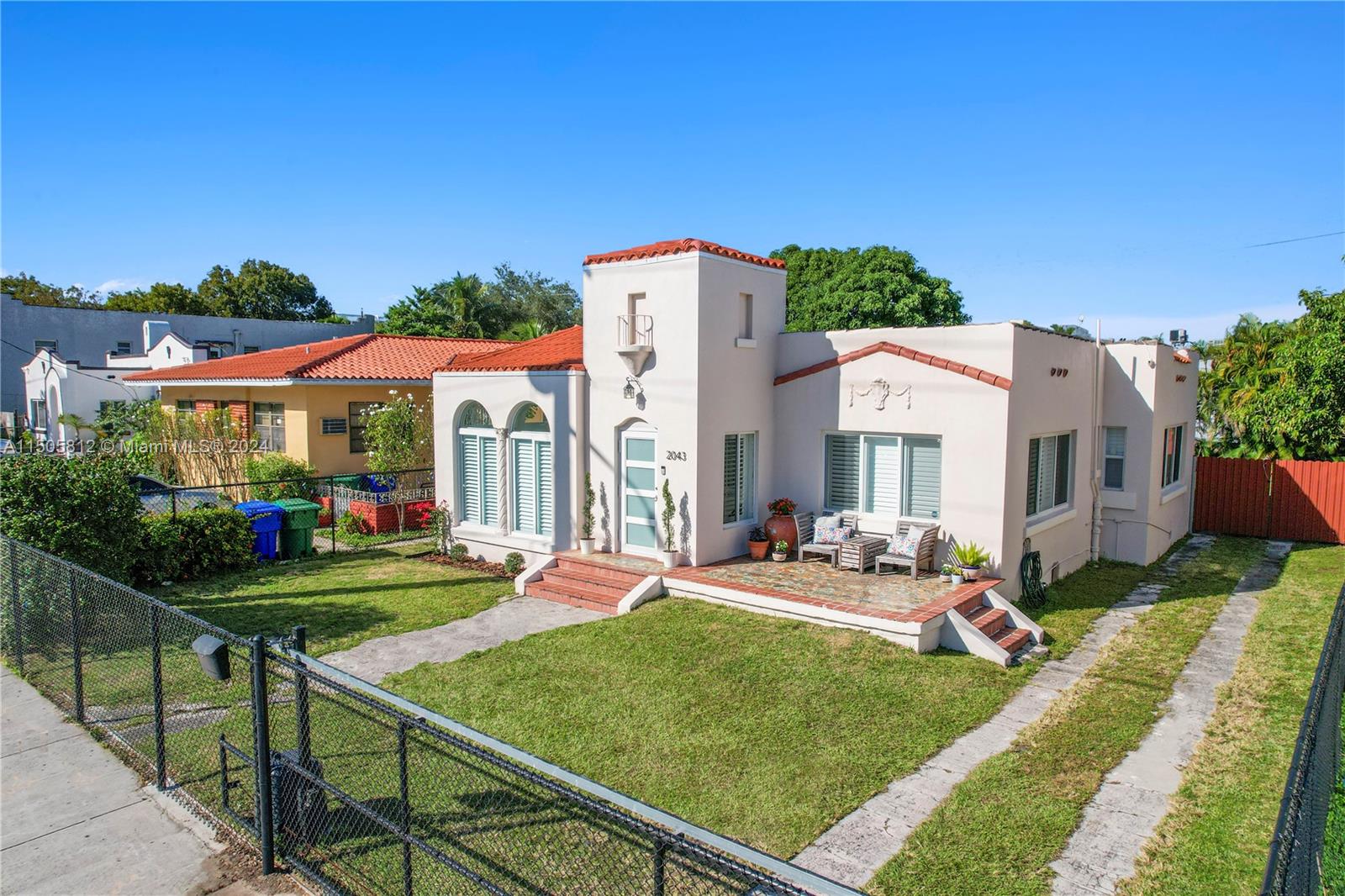 2043 Southwest 7th Street Miami, FL 33135 - Photo 31 of 37 a view of a house with backyard sitting area and garden