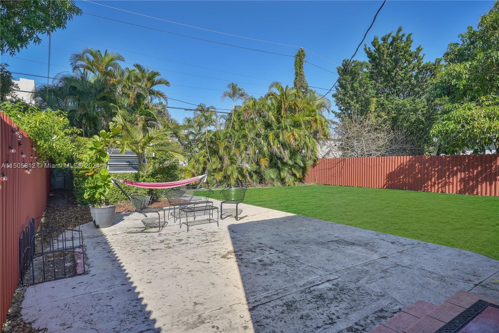 2043 Southwest 7th Street Miami, FL 33135 - Photo 36 of 37 a view of a chair and table on the garden