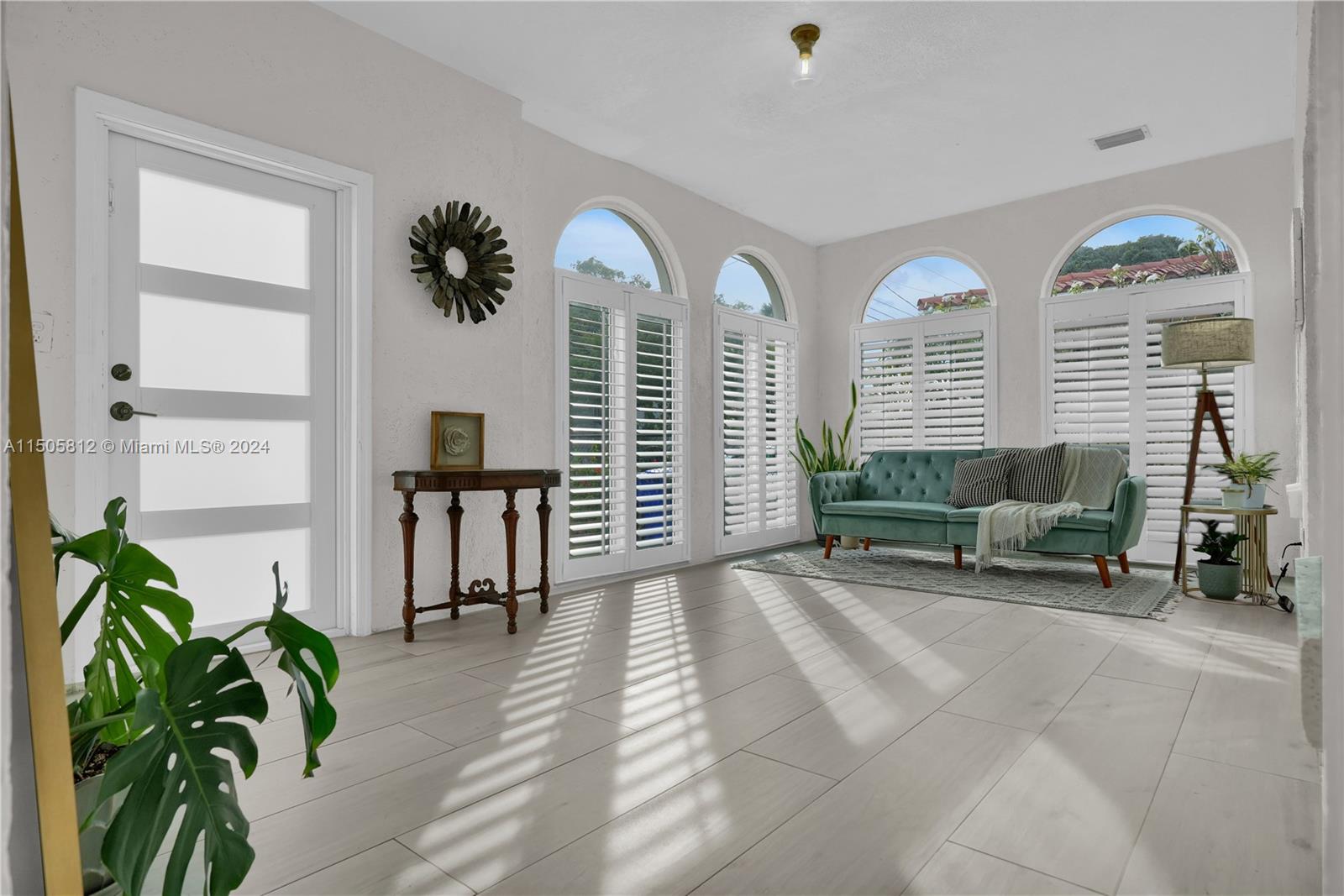 2043 Southwest 7th Street Miami, FL 33135 - Photo 7 of 37 a view of entryway with livingroom and furniture
