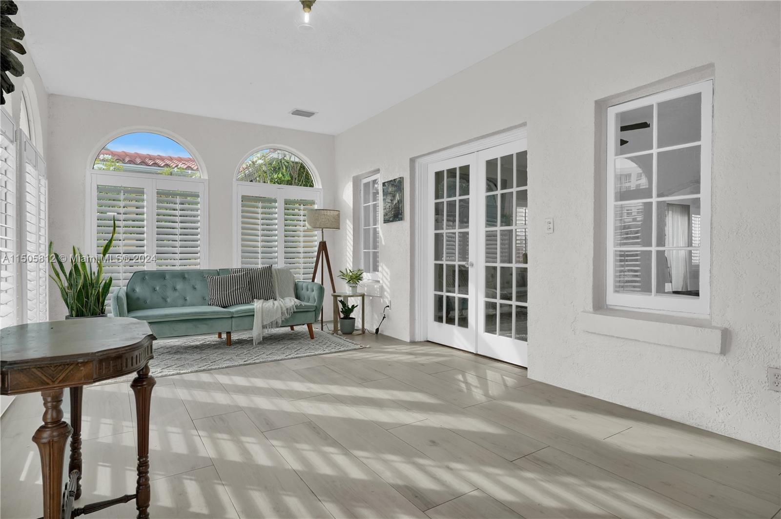 2043 Southwest 7th Street Miami, FL 33135 - Photo 8 of 37 a living room with furniture and windows
