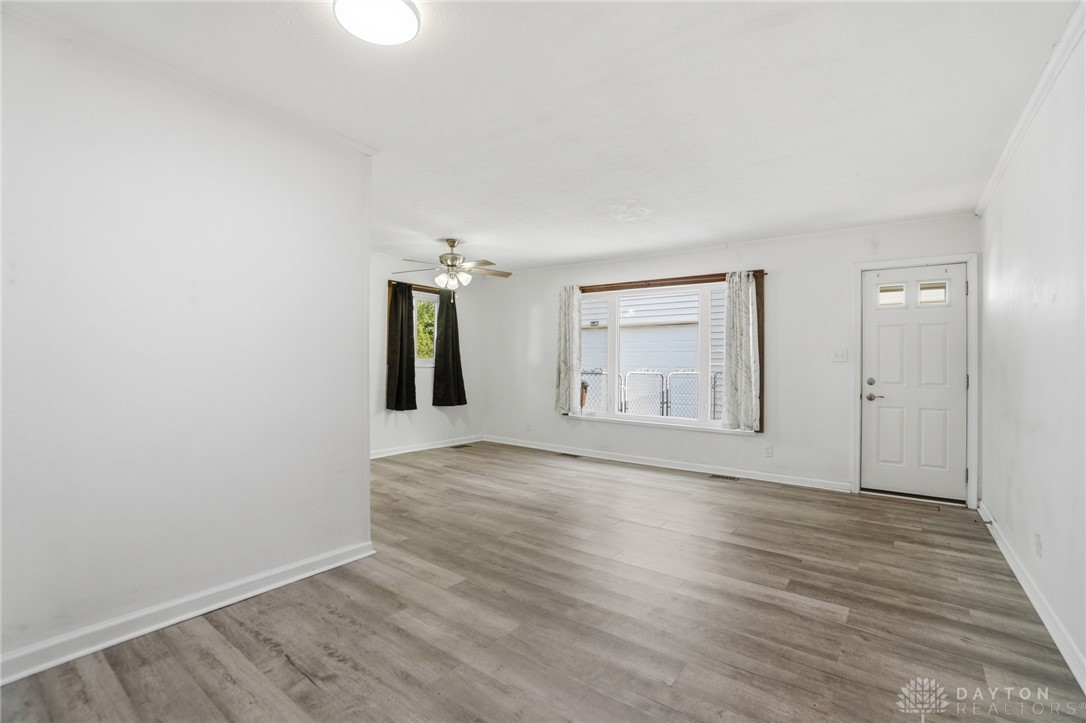 629 Storms Road Dayton, OH 45429 - Photo 51 of 51 This living area features a bright and open floorplan with durable flooring.