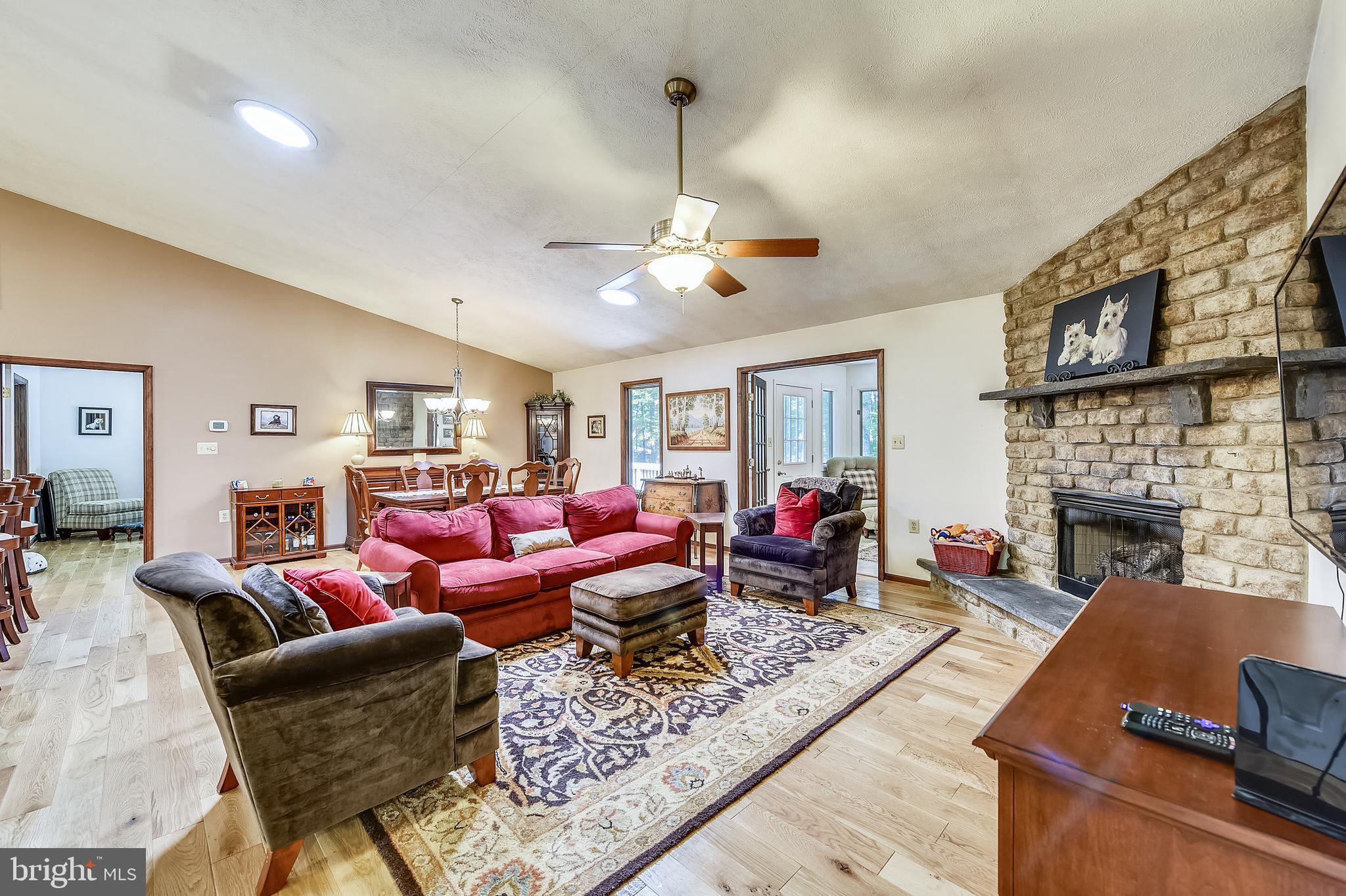 106 Federal Road Locust Grove, VA 22508 - Photo 5 of 43 Vaulted ceiling Living/Dining Room with fireplace.