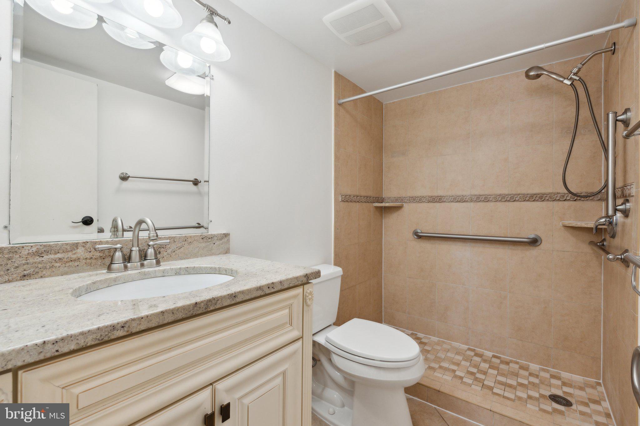 3031 Borge Street, Unit 211 Oakton, VA 22124 - Photo 21 of 35 En-suite Full Bathroom