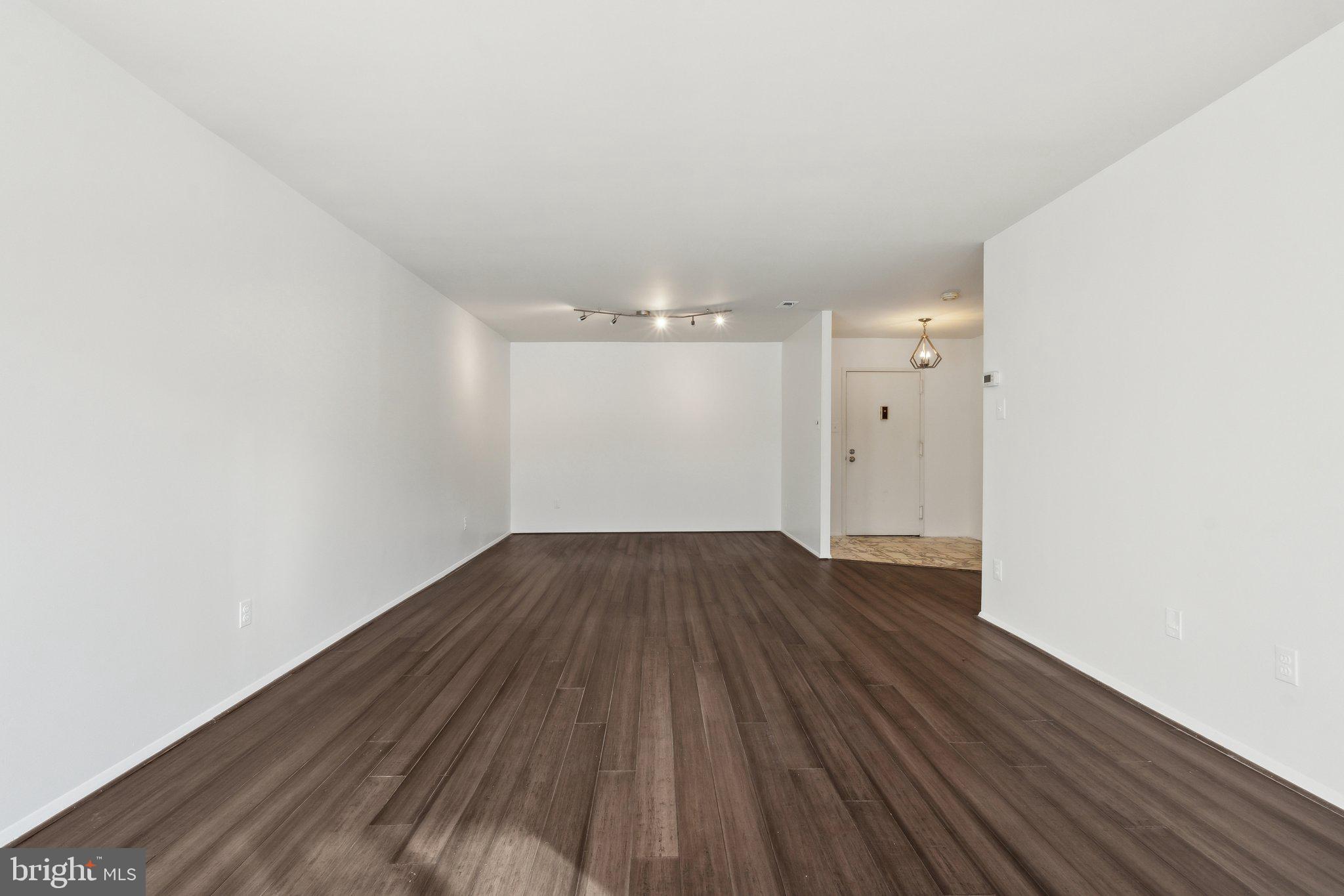 3031 Borge Street, Unit 211 Oakton, VA 22124 - Photo 6 of 35 Open Living & Dining Areas