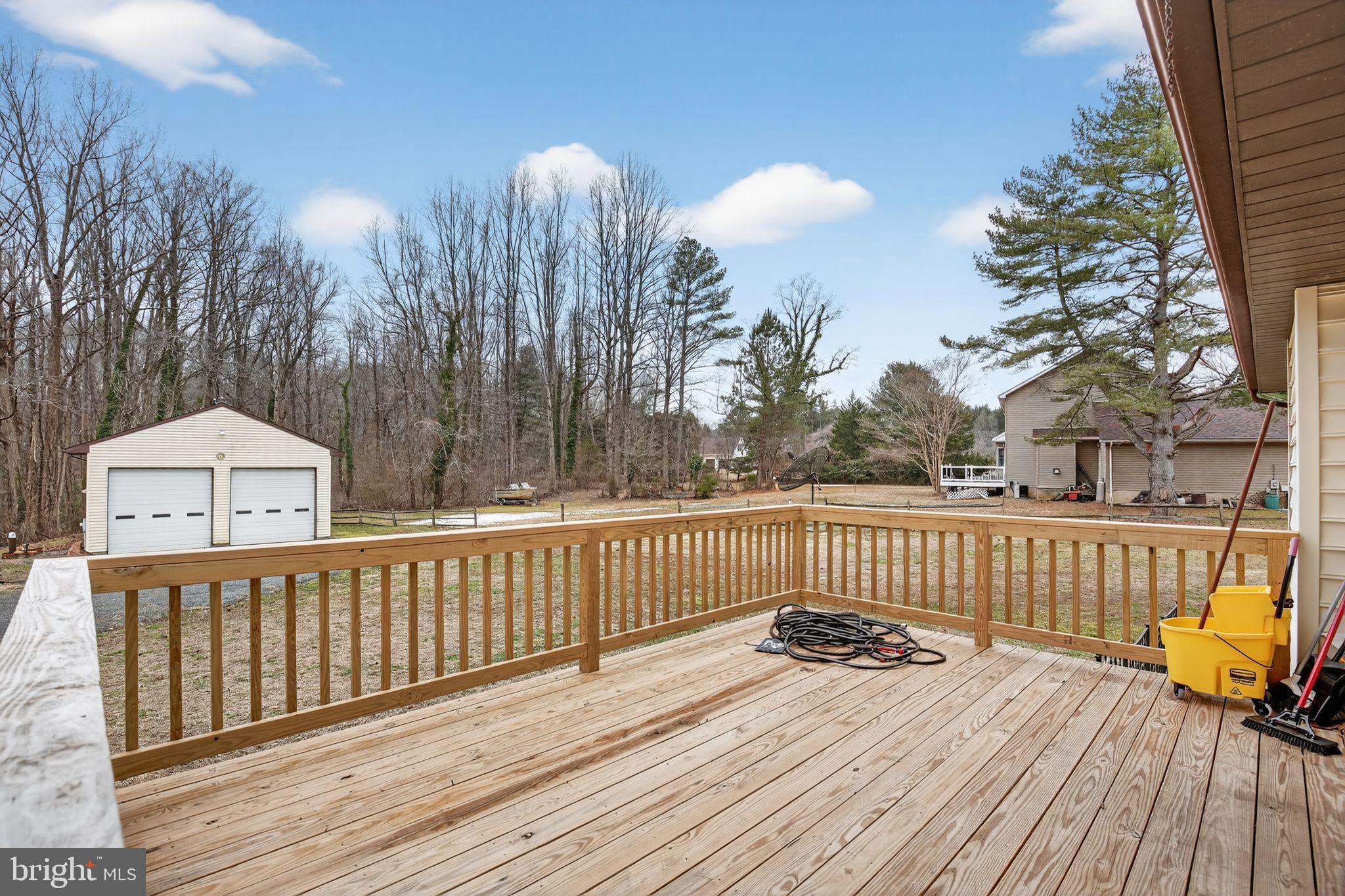 43447 Drum Cliff Road Hollywood, MD 20636 - Photo 15 of 37 Spacious deck with serene wooded views.