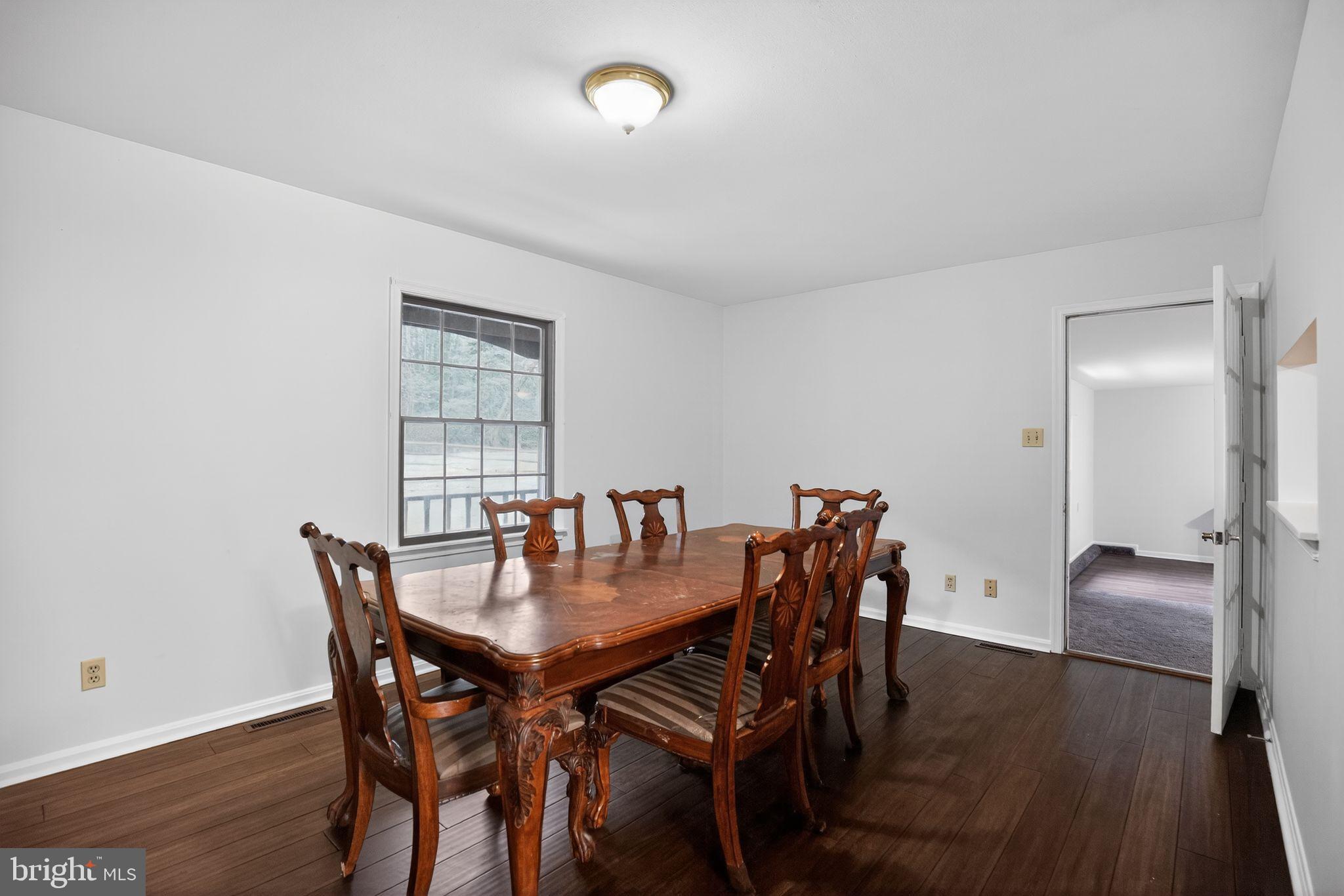 43447 Drum Cliff Road Hollywood, MD 20636 - Photo 18 of 37 Elegant dining space with natural light.