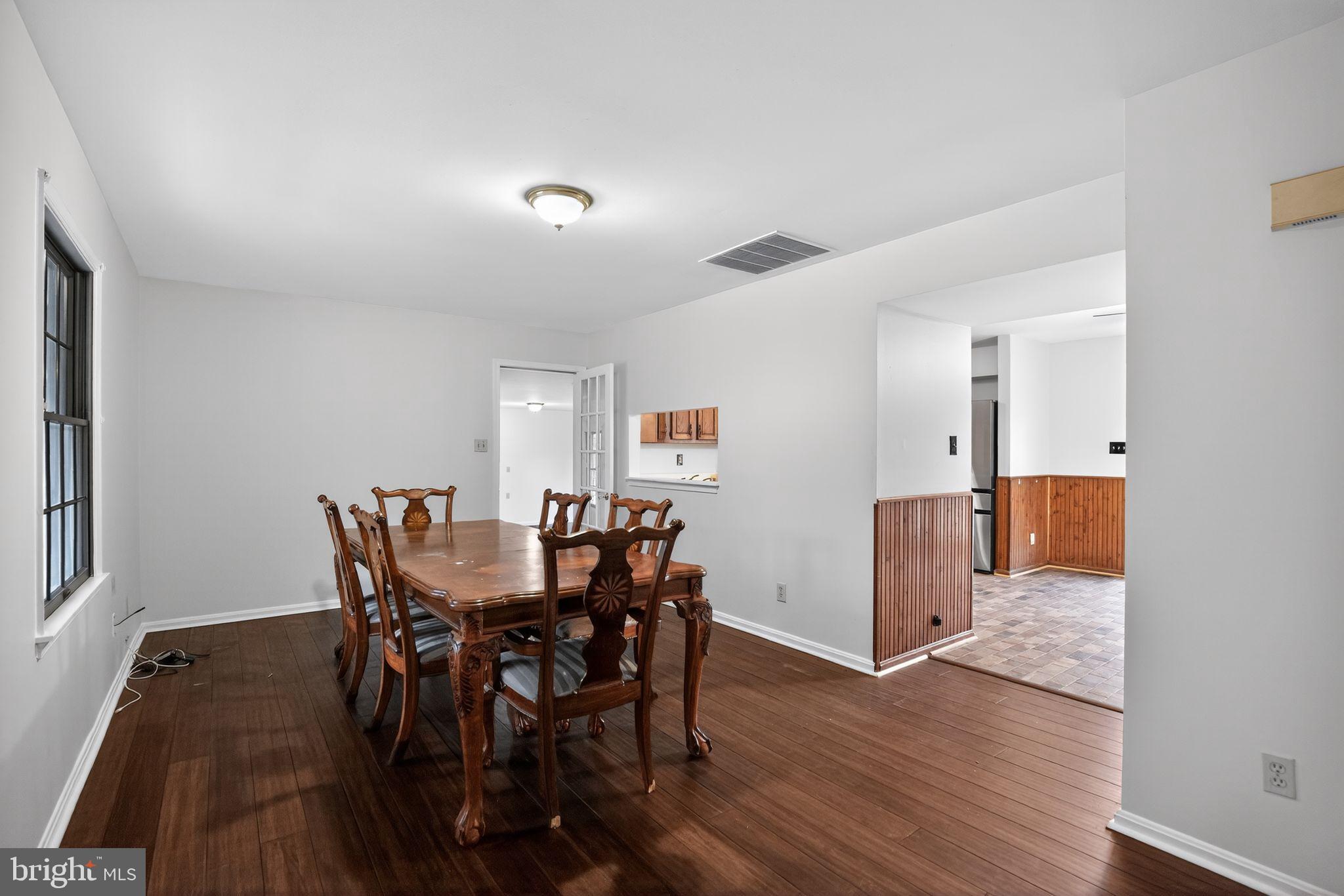 43447 Drum Cliff Road Hollywood, MD 20636 - Photo 20 of 37 Elegant dining space with warm wood tones.