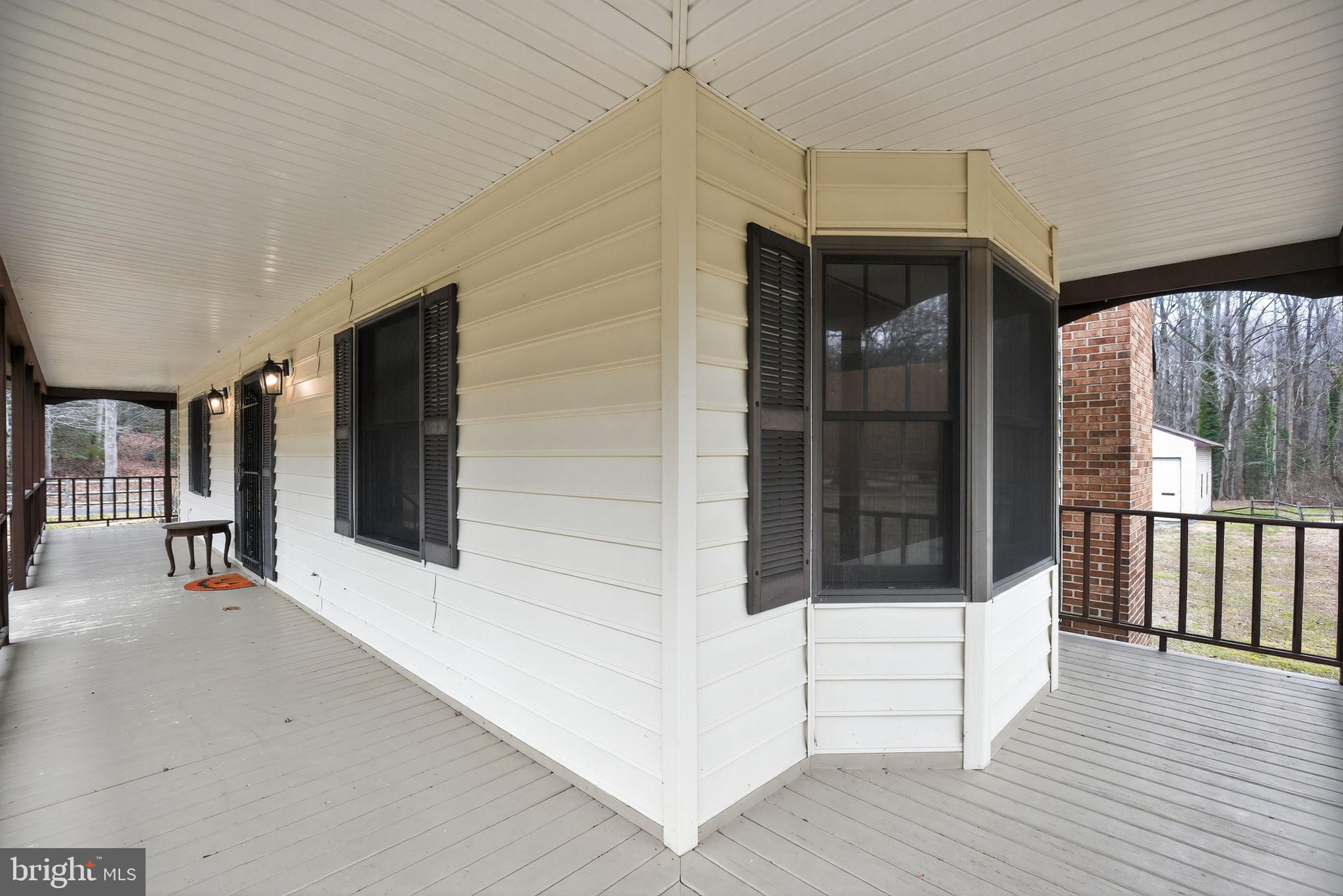 43447 Drum Cliff Road Hollywood, MD 20636 - Photo 2 of 37 Charming porch with inviting angles.