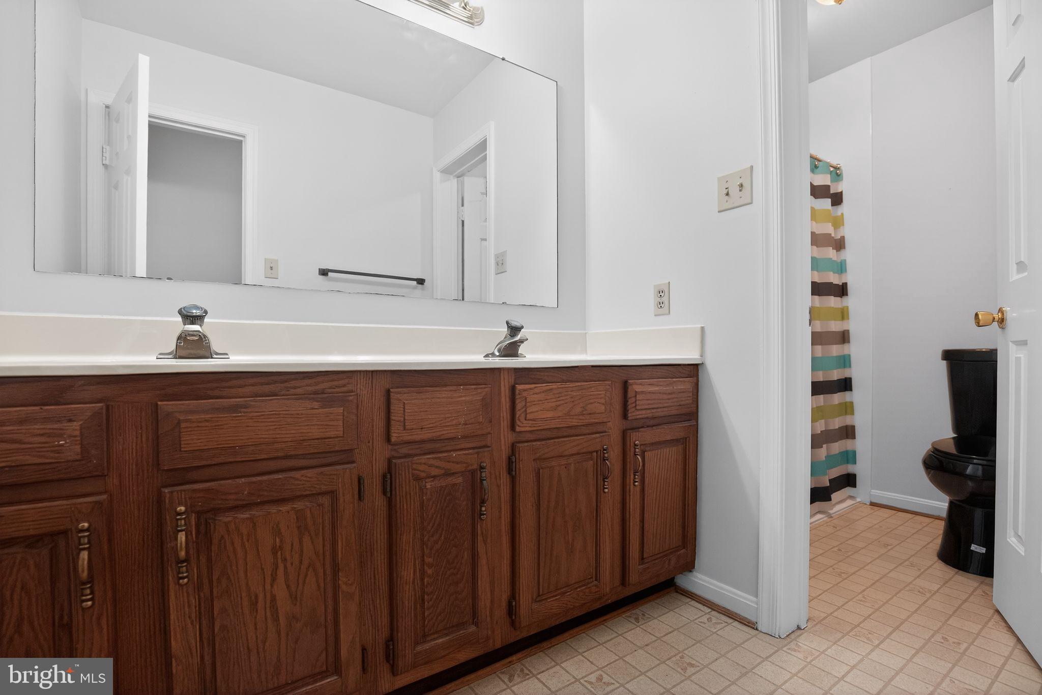 43447 Drum Cliff Road Hollywood, MD 20636 - Photo 30 of 37 Spacious bathroom with modern fixtures.