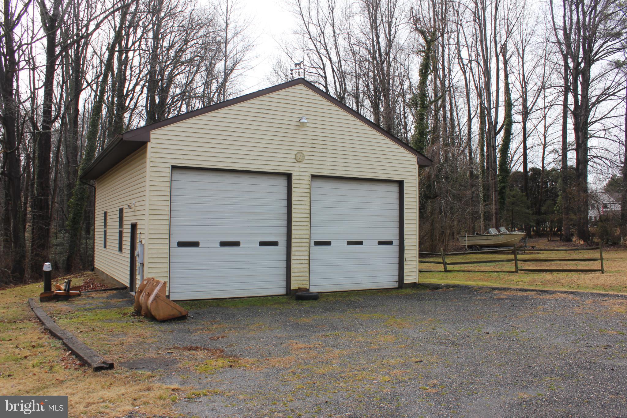 43447 Drum Cliff Road Hollywood, MD 20636 - Photo 3 of 37 a view of a house with backyard and wooden fence