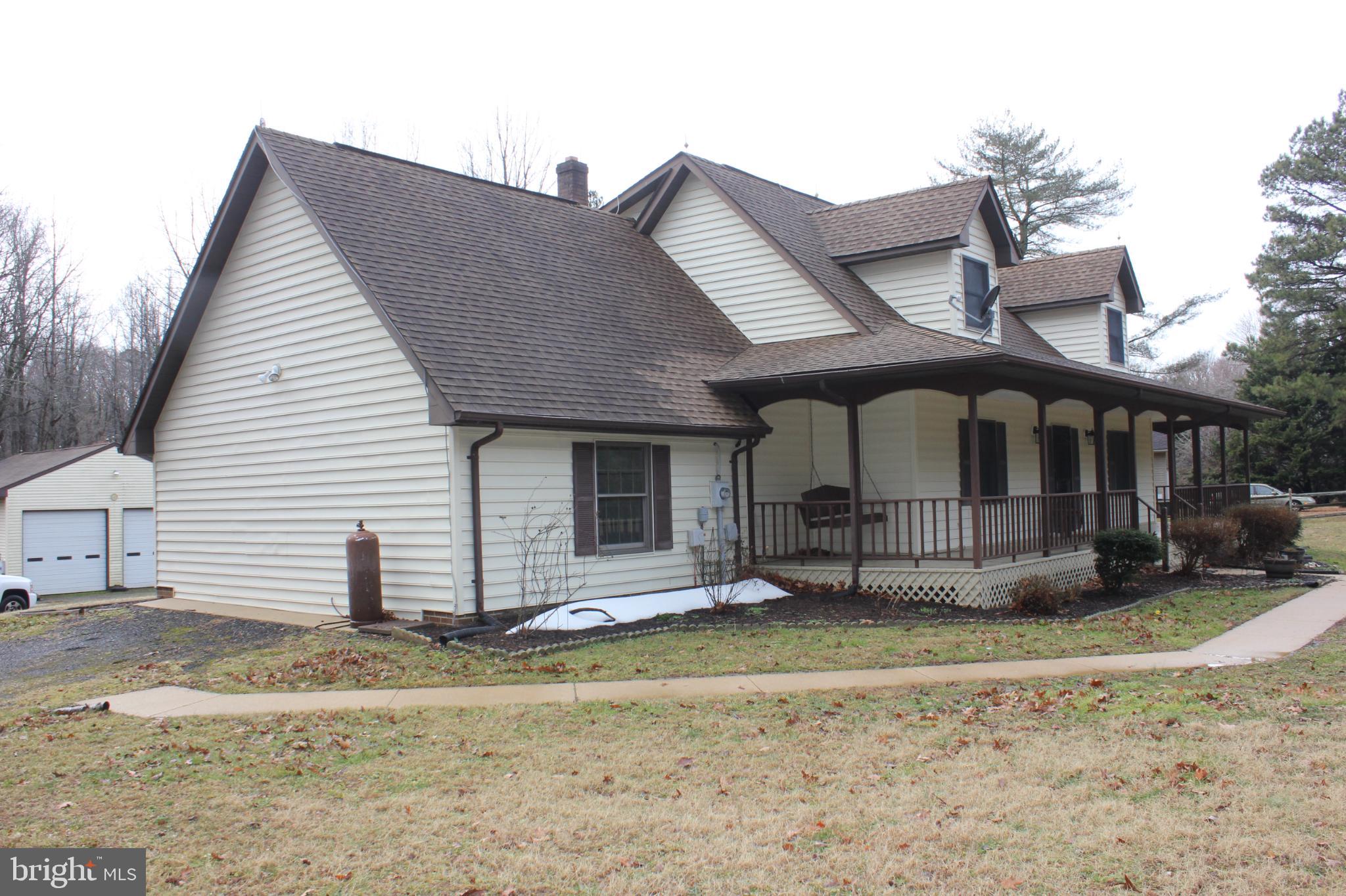 43447 Drum Cliff Road Hollywood, MD 20636 - Photo 36 of 37 a front view of a house with a yard