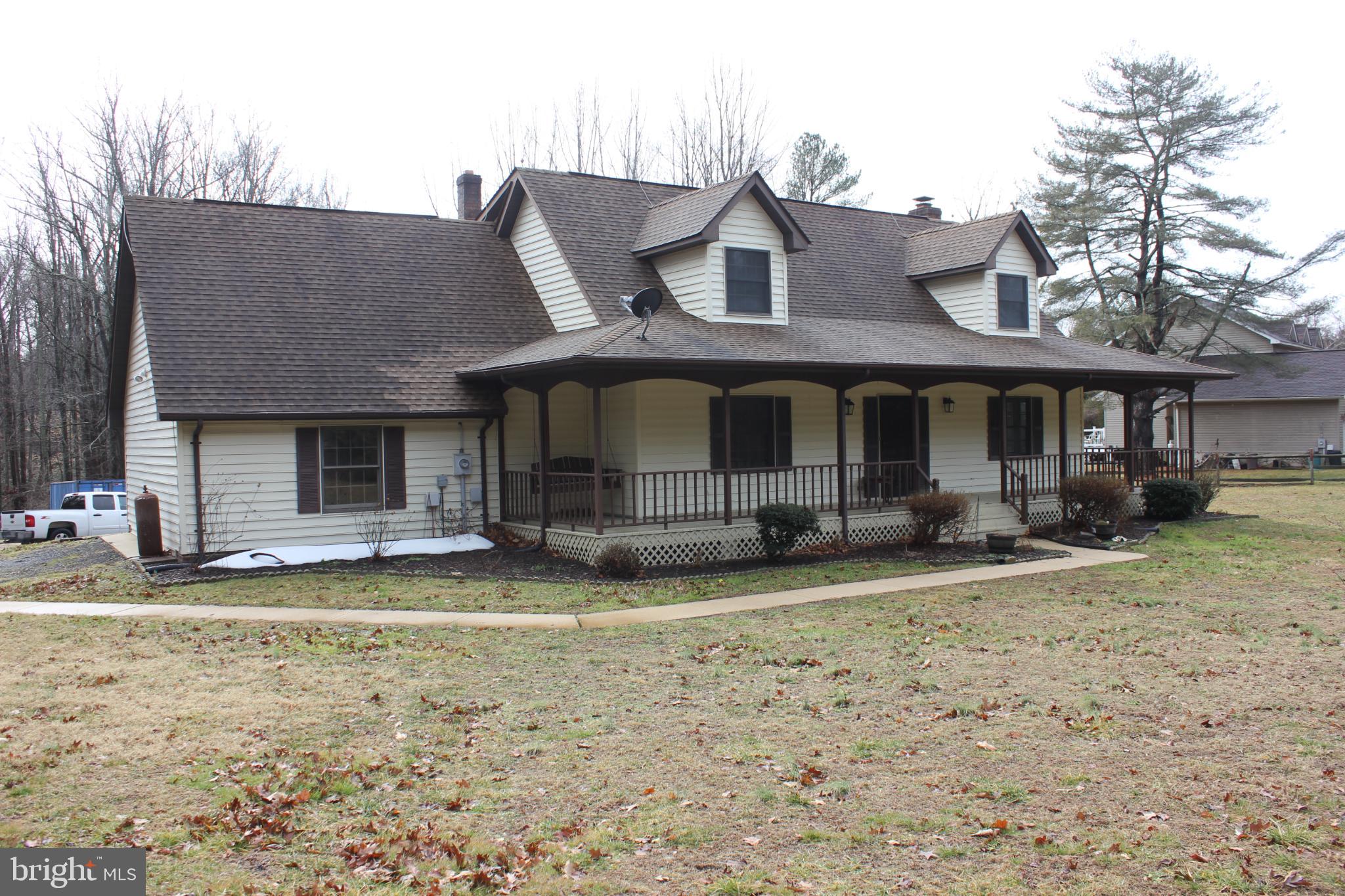 43447 Drum Cliff Road Hollywood, MD 20636 - Photo 37 of 37 a view of a house with a large window and a yard