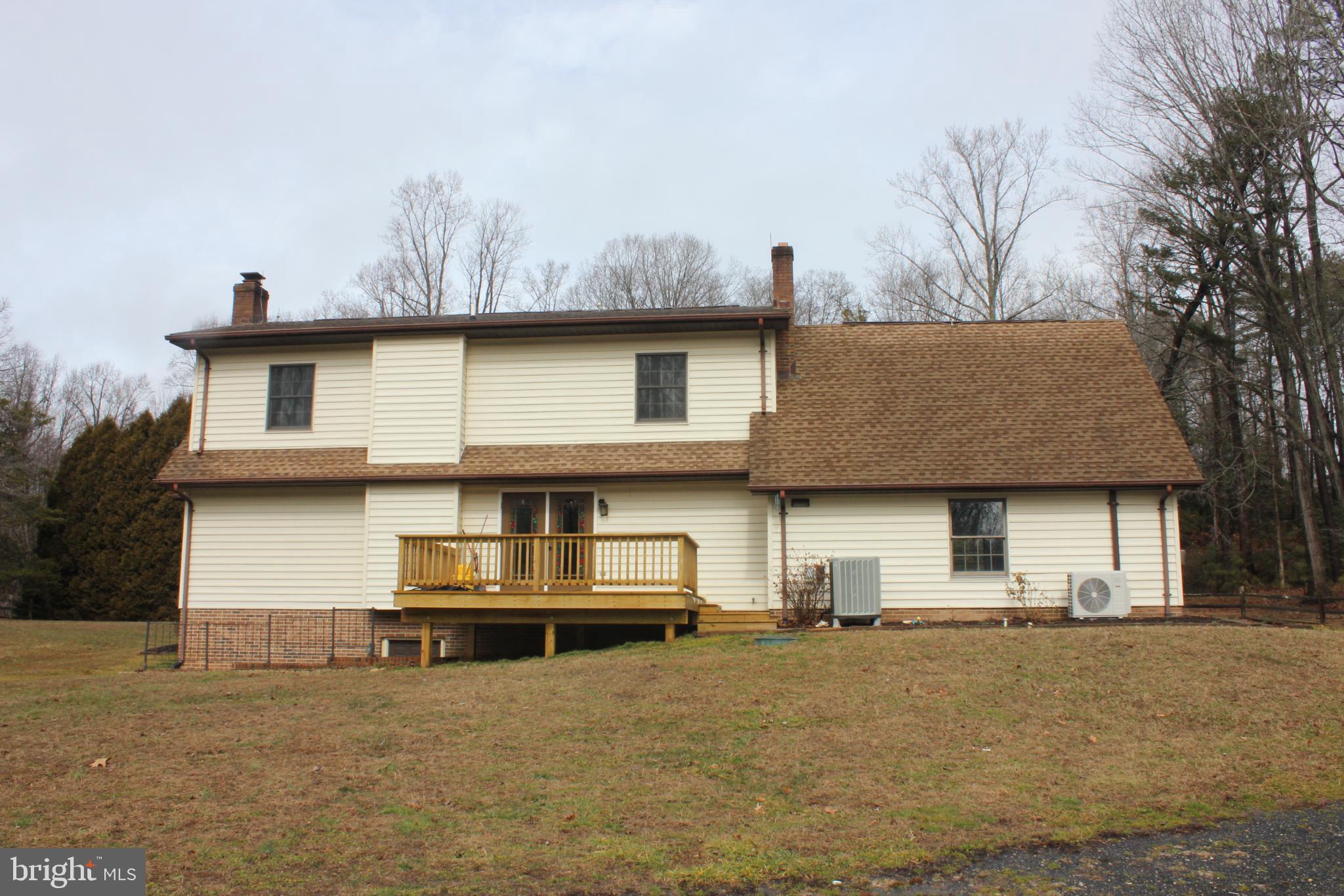 43447 Drum Cliff Road Hollywood, MD 20636 - Photo 4 of 37 a front view of a house with garage