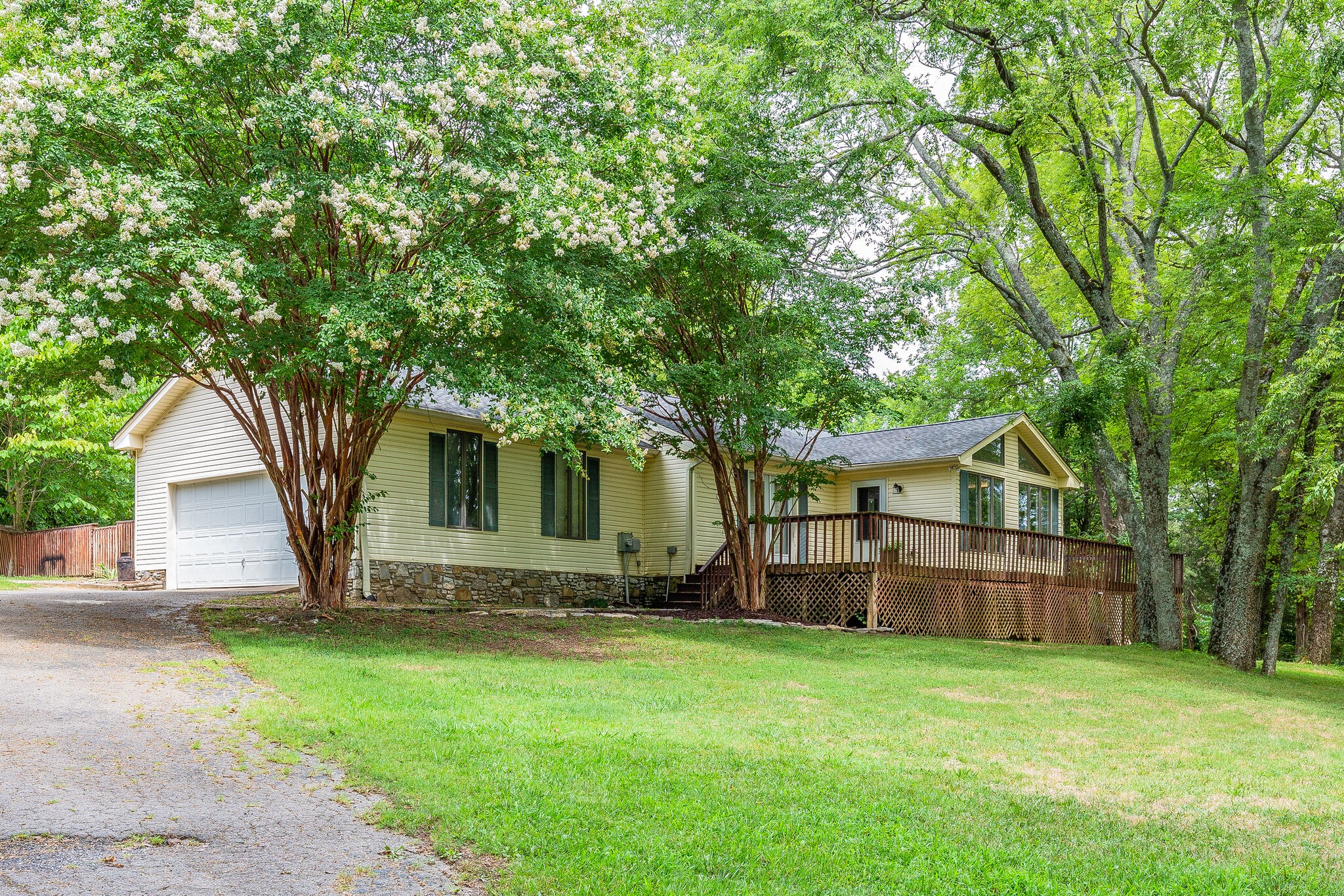 21 Cooks Road Mount Juliet, TN 37122 - Photo 3 of 35 a view of a backyard with a large tree