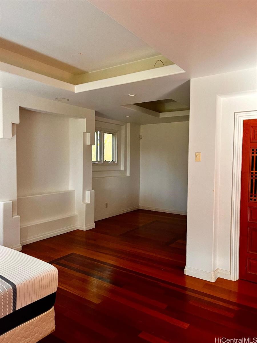 59-530 Hoalike Road Haleiwa, HI 96712 - Photo 14 of 25 a bedroom with a bed and a window