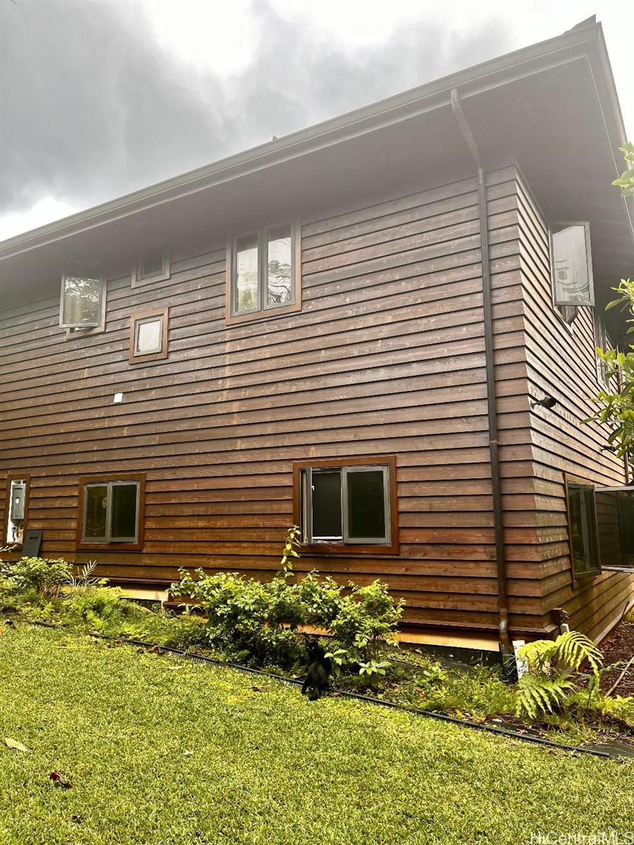 59-530 Hoalike Road Haleiwa, HI 96712 - Photo 23 of 25 a view of a house with a yard