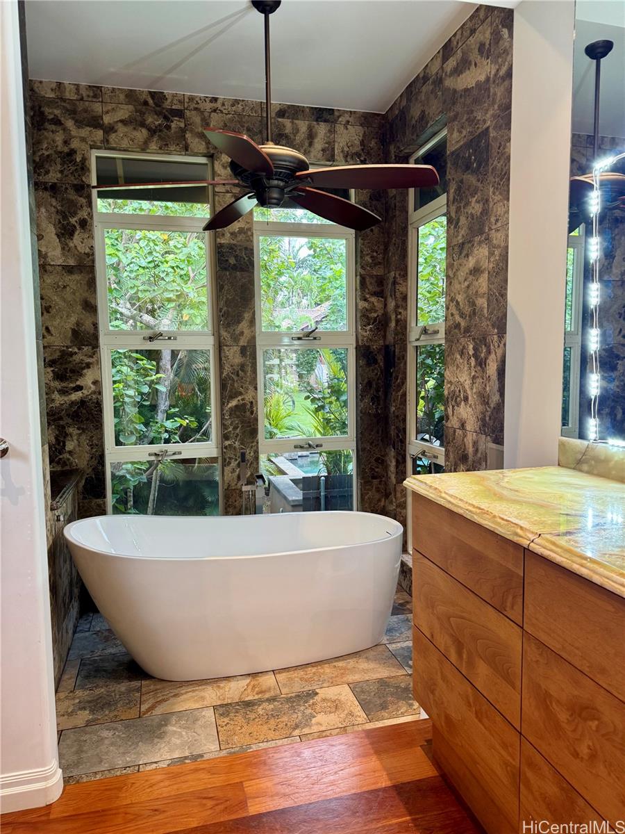 59-530 Hoalike Road Haleiwa, HI 96712 - Photo 25 of 25 a view of a bathtub in wooden floor