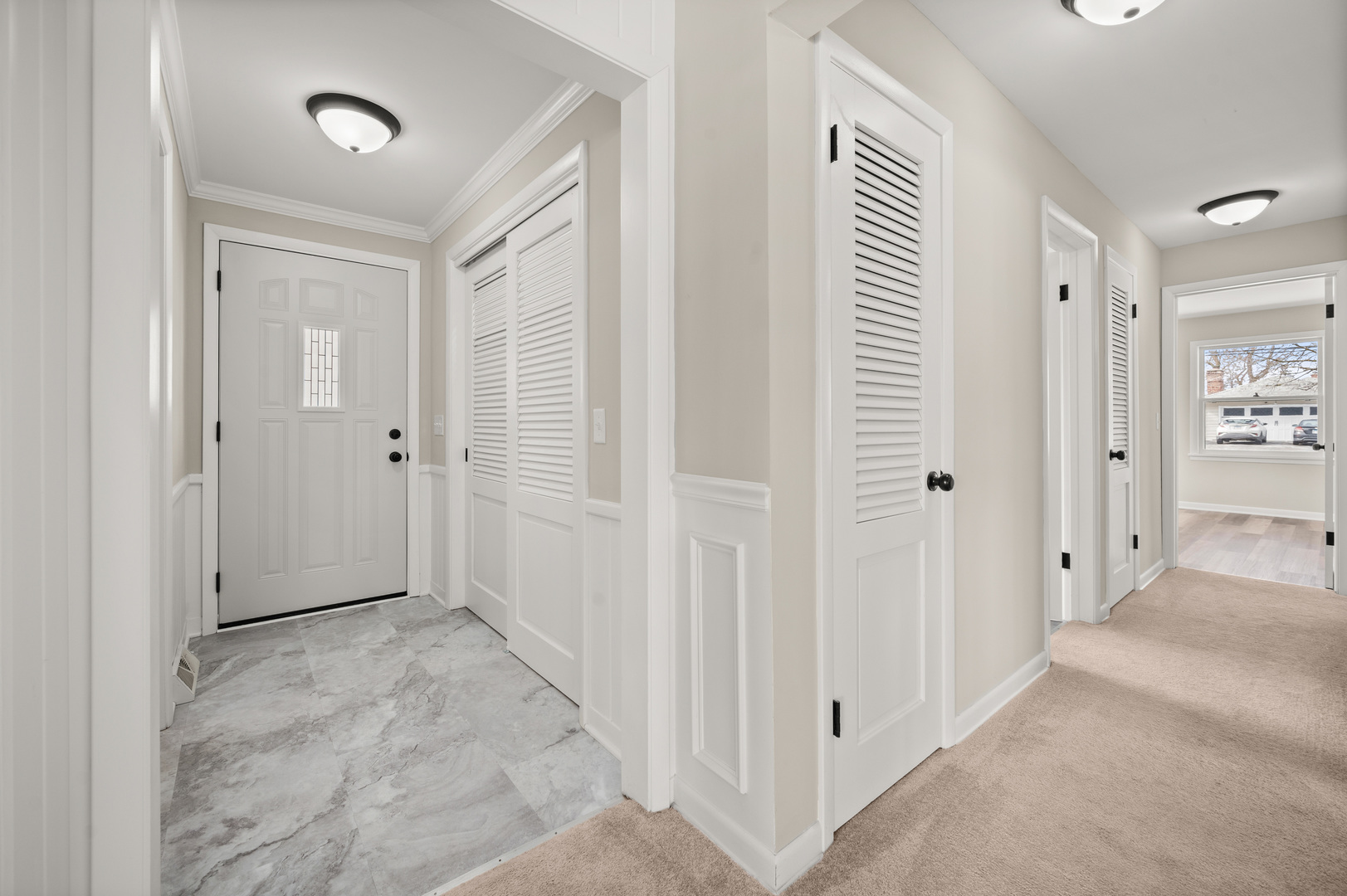 804 Normal Road DeKalb, IL 60115 - Photo 7 of 27 a view of a hallway with wooden floor and closet area