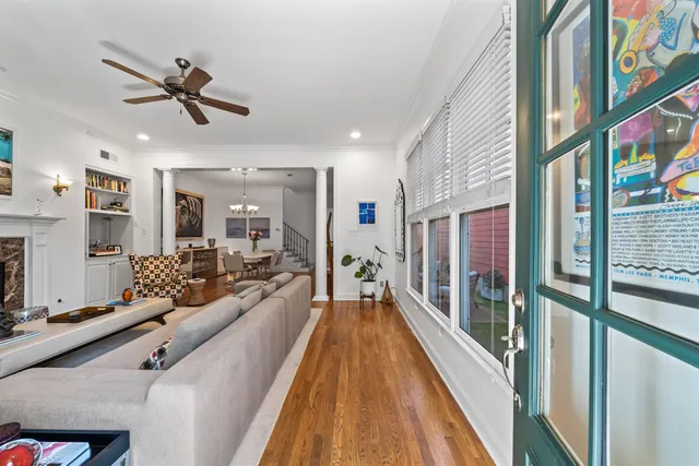 a view of a living room with a large window