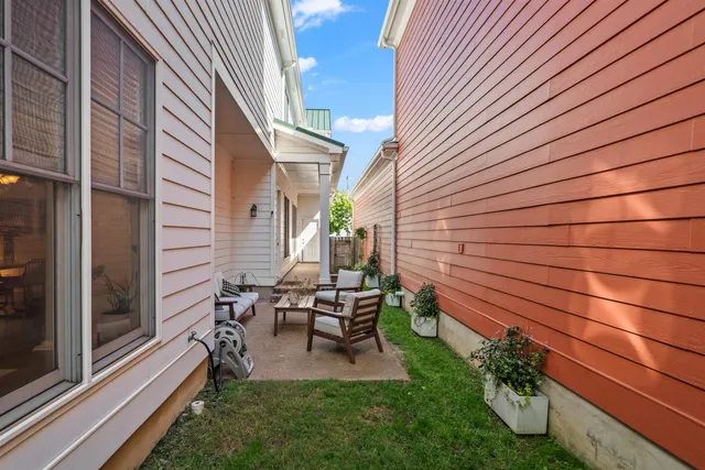 a garden view with a seating space