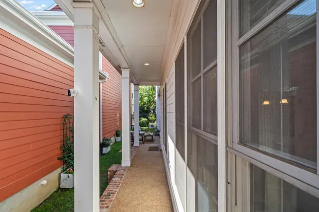 a view of a porch with wooden floor and stairs