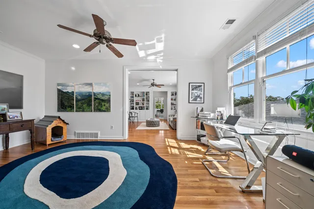 a view of a living room and dining room