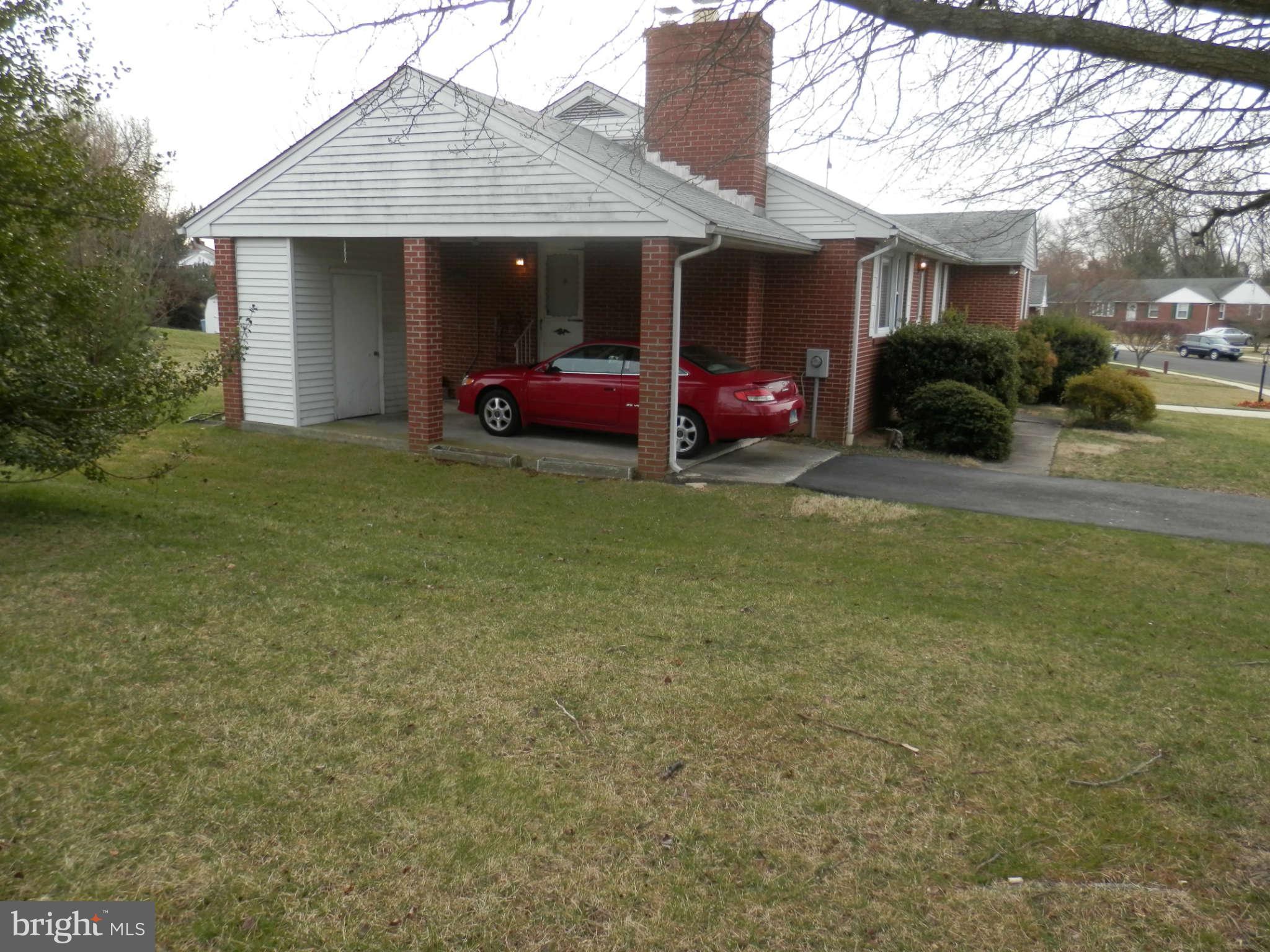 9400 Dawnvale Road Baltimore, MD 21236 - Photo 3 of 5 a front view of a house with garden